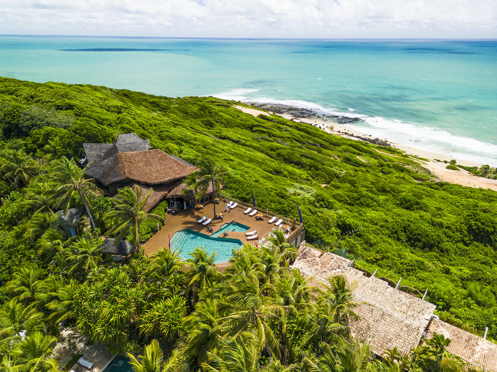 Aerial view of the cliffs and turquoise sea at Pipa Beach, Rio Grande do Norte